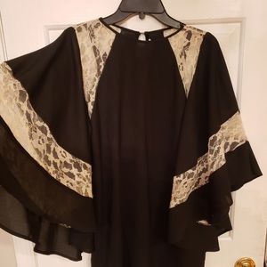 a black dress with white lace details